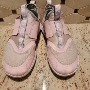 Girls size 2Y Light pink and silver Nike sneakers.